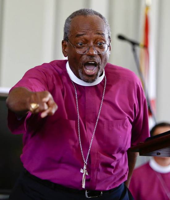 Michael Curry, Episcopal Presiding Bishop-Elect, preaching this summer in Hayneville, Alabama at the 50th anniversary of the martyrdom of civil rights activist Jonathan Daniels, a seminarian. (Selma Times Journal)